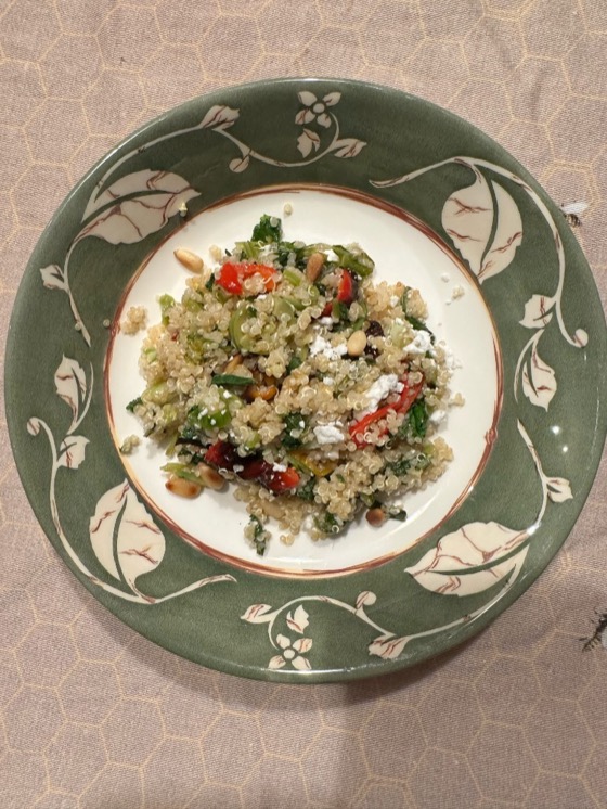 Lemony quinoa with radish greens, sweet peppers, pine nuts, and crumbled feta